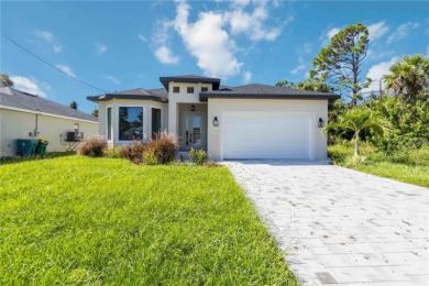 This brand-new, custom-built residence is nestled in the serene on Rotonda Golf and Country Club The Palms Course in Florida - for sale on GolfHomes.com, golf home, golf lot