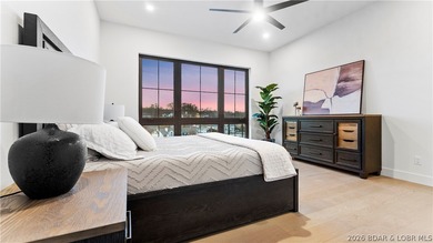 Recently completed by Thomas Construction, this luxury residence on The Oaks Golf Course in Missouri - for sale on GolfHomes.com, golf home, golf lot