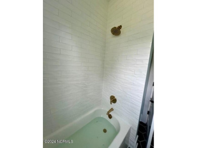 Nestled in a private cul-de-sac within the prestigious brick on Belvedere Country Club in North Carolina - for sale on GolfHomes.com, golf home, golf lot