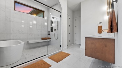 Recently completed by Thomas Construction, this luxury residence on The Oaks Golf Course in Missouri - for sale on GolfHomes.com, golf home, golf lot