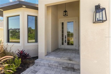 This brand-new, custom-built residence is nestled in the serene on Rotonda Golf and Country Club The Palms Course in Florida - for sale on GolfHomes.com, golf home, golf lot