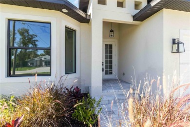 This brand-new, custom-built residence is nestled in the serene on Rotonda Golf and Country Club The Palms Course in Florida - for sale on GolfHomes.com, golf home, golf lot