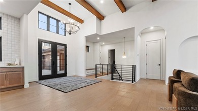 Recently completed by Thomas Construction, this luxury residence on The Oaks Golf Course in Missouri - for sale on GolfHomes.com, golf home, golf lot