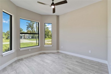 This brand-new, custom-built residence is nestled in the serene on Rotonda Golf and Country Club The Palms Course in Florida - for sale on GolfHomes.com, golf home, golf lot