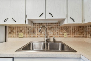 Under contract-accepting backup offers. This 1st floor condo on on On Top Of The World Golf Course in Florida - for sale on GolfHomes.com, golf home, golf lot