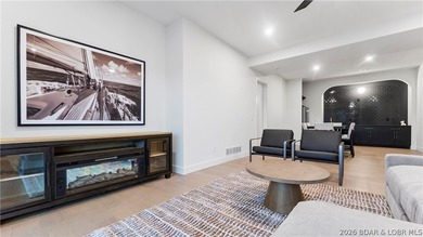 Recently completed by Thomas Construction, this luxury residence on The Oaks Golf Course in Missouri - for sale on GolfHomes.com, golf home, golf lot