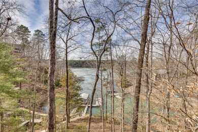 A lake house with a fabulous long range view! This custom built on Keowee Key Golf and Country Club in South Carolina - for sale on GolfHomes.com, golf home, golf lot