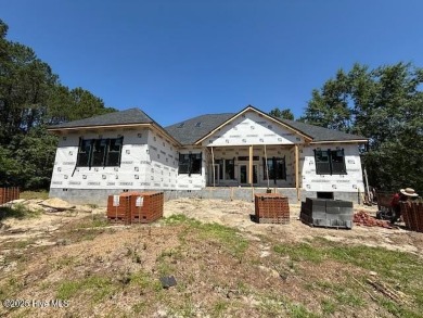 Nestled in a private cul-de-sac within the prestigious brick on Belvedere Country Club in North Carolina - for sale on GolfHomes.com, golf home, golf lot