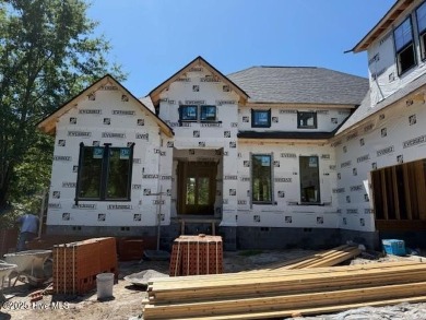 Nestled in a private cul-de-sac within the prestigious brick on Belvedere Country Club in North Carolina - for sale on GolfHomes.com, golf home, golf lot