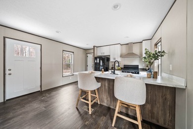 Discover a fresh take on lakeside living in this 2024 mobile on Lake Tansi Village Country Club in Tennessee - for sale on GolfHomes.com, golf home, golf lot