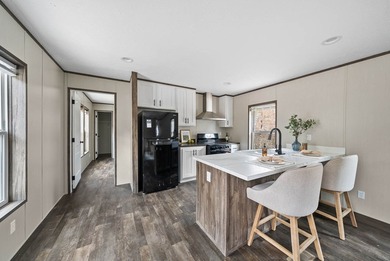 Discover a fresh take on lakeside living in this 2024 mobile on Lake Tansi Village Country Club in Tennessee - for sale on GolfHomes.com, golf home, golf lot