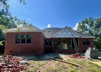 Nestled in a private cul-de-sac within the prestigious brick on Belvedere Country Club in North Carolina - for sale on GolfHomes.com, golf home, golf lot