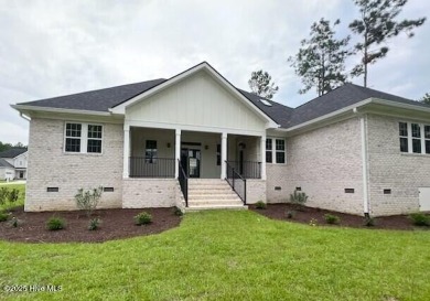 Nestled in a private cul-de-sac within the prestigious brick on Belvedere Country Club in North Carolina - for sale on GolfHomes.com, golf home, golf lot