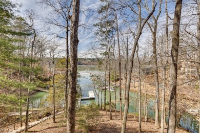 A lake house with a fabulous long range view! This custom built on Keowee Key Golf and Country Club in South Carolina - for sale on GolfHomes.com, golf home, golf lot