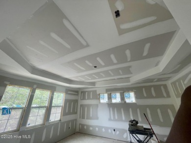 Nestled in a private cul-de-sac within the prestigious brick on Belvedere Country Club in North Carolina - for sale on GolfHomes.com, golf home, golf lot