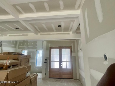 Nestled in a private cul-de-sac within the prestigious brick on Belvedere Country Club in North Carolina - for sale on GolfHomes.com, golf home, golf lot