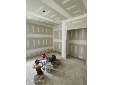 Nestled in a private cul-de-sac within the prestigious brick on Belvedere Country Club in North Carolina - for sale on GolfHomes.com, golf home, golf lot