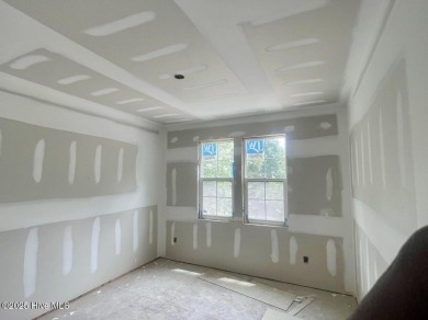 Nestled in a private cul-de-sac within the prestigious brick on Belvedere Country Club in North Carolina - for sale on GolfHomes.com, golf home, golf lot