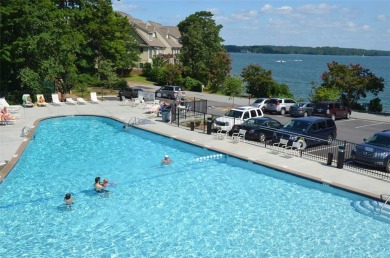 A lake house with a fabulous long range view! This custom built on Keowee Key Golf and Country Club in South Carolina - for sale on GolfHomes.com, golf home, golf lot