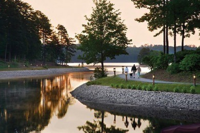 A lake house with a fabulous long range view! This custom built on Keowee Key Golf and Country Club in South Carolina - for sale on GolfHomes.com, golf home, golf lot