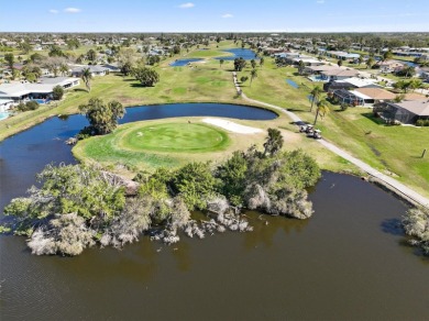 Under contract-accepting backup offers. WELCOME TO ROTONDA WEST! on Pinemoor West Golf Club in Florida - for sale on GolfHomes.com, golf home, golf lot