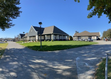 Level lot with golf course view on Tellico Village -The Links At Kahite Golf Course in Tennessee - for sale on GolfHomes.com, golf home, golf lot