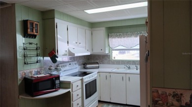 PRICE IMPROVEMENT!!!! This cozy and comfortable GOLF COURSE home on High Point Golf Club, Inc. in Florida - for sale on GolfHomes.com, golf home, golf lot
