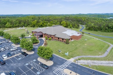 Level lot with golf course view on Tellico Village -The Links At Kahite Golf Course in Tennessee - for sale on GolfHomes.com, golf home, golf lot