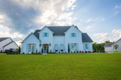 Indulge in luxury living with this magnificent 5-bedroom, 4 full on Kinderlou Forest Golf Club in Georgia - for sale on GolfHomes.com, golf home, golf lot