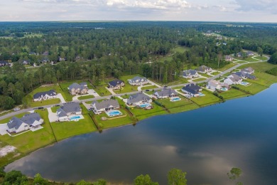 Indulge in luxury living with this magnificent 5-bedroom, 4 full on Kinderlou Forest Golf Club in Georgia - for sale on GolfHomes.com, golf home, golf lot