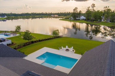 Indulge in luxury living with this magnificent 5-bedroom, 4 full on Kinderlou Forest Golf Club in Georgia - for sale on GolfHomes.com, golf home, golf lot