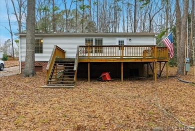 Here it is! 408 Longwood Dr, Bracey, VA -- a value-priced home on Tanglewood Shores Golf Club in Virginia - for sale on GolfHomes.com, golf home, golf lot