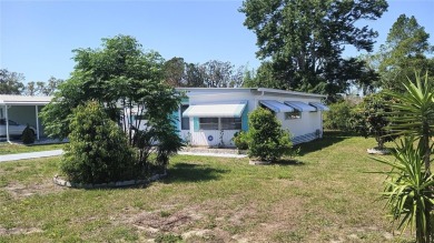 PRICE IMPROVEMENT!!!! This cozy and comfortable GOLF COURSE home on High Point Golf Club, Inc. in Florida - for sale on GolfHomes.com, golf home, golf lot