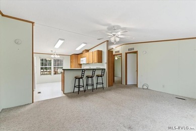 Here it is! 408 Longwood Dr, Bracey, VA -- a value-priced home on Tanglewood Shores Golf Club in Virginia - for sale on GolfHomes.com, golf home, golf lot