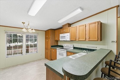 Here it is! 408 Longwood Dr, Bracey, VA -- a value-priced home on Tanglewood Shores Golf Club in Virginia - for sale on GolfHomes.com, golf home, golf lot