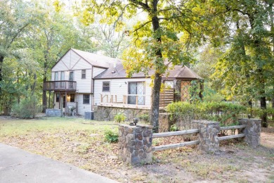 This lovely home on the 13th hole of the Indian Hills golf on Indian Hills Country Club in Arkansas - for sale on GolfHomes.com, golf home, golf lot