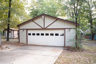 This lovely home on the 13th hole of the Indian Hills golf on Indian Hills Country Club in Arkansas - for sale on GolfHomes.com, golf home, golf lot