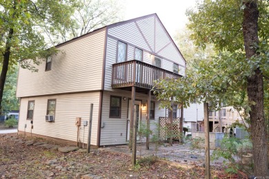 This lovely home on the 13th hole of the Indian Hills golf on Indian Hills Country Club in Arkansas - for sale on GolfHomes.com, golf home, golf lot