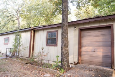 This lovely home on the 13th hole of the Indian Hills golf on Indian Hills Country Club in Arkansas - for sale on GolfHomes.com, golf home, golf lot