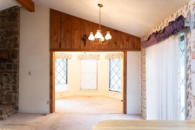 This lovely home on the 13th hole of the Indian Hills golf on Indian Hills Country Club in Arkansas - for sale on GolfHomes.com, golf home, golf lot