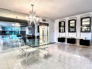 Welcome to this spacious and well-maintained 3-bedroom, 2.5-bath on Palm-Aire Country Club and Resort - The Oaks in Florida - for sale on GolfHomes.com, golf home, golf lot