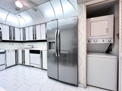 Welcome to this spacious and well-maintained 3-bedroom, 2.5-bath on Palm-Aire Country Club and Resort - The Oaks in Florida - for sale on GolfHomes.com, golf home, golf lot