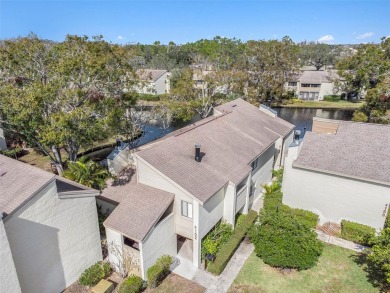 FIRST FLOOR CORNER UNIT! ~ AC CHANGED IN 2022. WATERFRONT VIEW on Emerald Greens Golf Resort and Country Club in Florida - for sale on GolfHomes.com, golf home, golf lot