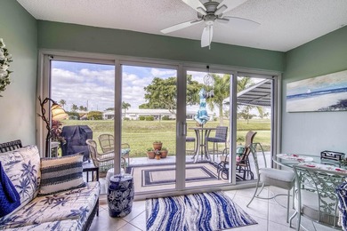 Enjoy the best of South Florida living in this beautifully on  in Florida - for sale on GolfHomes.com, golf home, golf lot