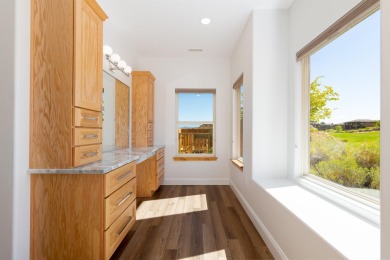 Introducing this beautifully updated ranch style home adjacent on The Golf Club At Redlands Mesa in Colorado - for sale on GolfHomes.com, golf home, golf lot