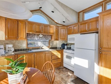 Charming 1-bedroom, 1 full bathroom cottage at beautiful Apple on Apple Island Golf Course At Apple Island Resort in Vermont - for sale on GolfHomes.com, golf home, golf lot