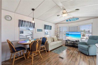 Welcome to this cozy and efficient 1-bedroom manufactured home on Del Tura Golf and Country Club in Florida - for sale on GolfHomes.com, golf home, golf lot