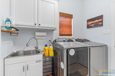 This well-maintained 3-bedroom, 2.5-bath home offers peaceful on South Padre Island Golf Club in Texas - for sale on GolfHomes.com, golf home, golf lot