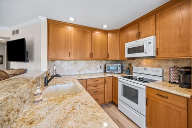 Dramatic lake, fairway and views of the Santa Rosa Mountains on Palm Royale Country Club in California - for sale on GolfHomes.com, golf home, golf lot