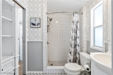 Welcome to this cozy and efficient 1-bedroom manufactured home on Del Tura Golf and Country Club in Florida - for sale on GolfHomes.com, golf home, golf lot
